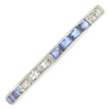 A mid 20th century platinum diamond and sapphire eternity ring.Ring size L.