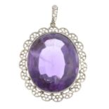 An amethyst and diamond cluster pendant.Calculated weight of amethyst 38.12cts,