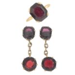 A garnet single-stone ring and a pair of garnet earrings.Ring size H1/2.