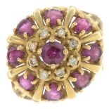 A 14ct gold ruby and diamond cluster ring.Maker's marks for Fratelli Coppini.Estimated total