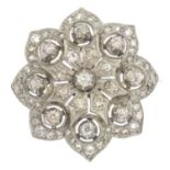 A late 19th century continental silver and gold diamond cluster brooch.Estimated total diamond