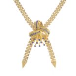 A 1960's 9ct gold necklace, with sapphire spray, suspended from a brick-link chain.