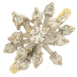 An 18ct gold diamond snowflake ring.Estimated total diamond weight 0.70ct,
