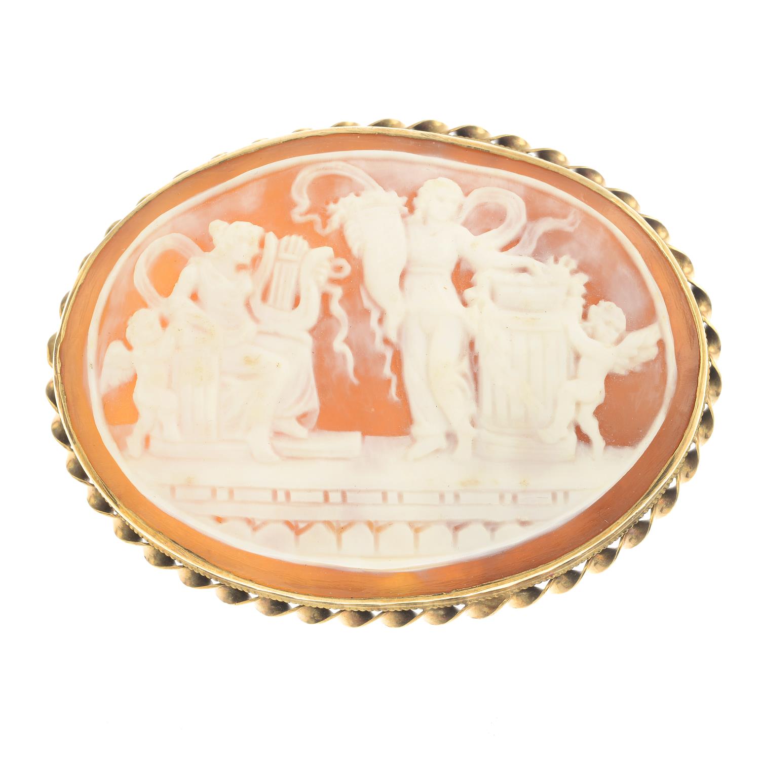 A 9ct gold mounted shell cameo brooch, depicting a classical scene.Hallmarks for Birmingham, 1976.