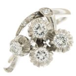 A mid 20th century platinum diamond dress ring.Estimated total diamond weight 0.45ct,