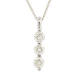 An 18ct gold diamond pendant,