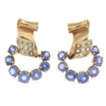 A pair of mid 20th century gold sapphire and diamond earrings.Estimated total diamond weight