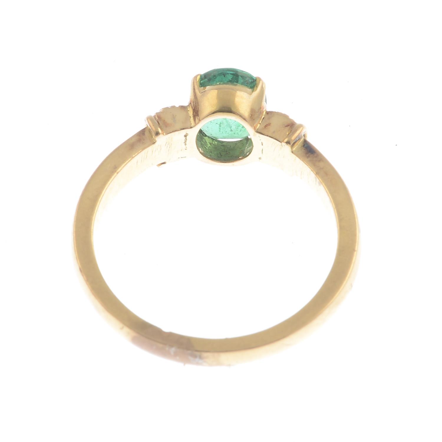 An emerald and diamond ring.Emerald calculated weight 0.70ct, - Image 2 of 3