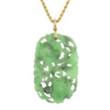 A jade pendant, suspended from a rope-link chain.