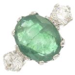 An 18ct gold emerald and brilliant-cut diamond three-stone ring.Emerald calculated weight 4.94cts,