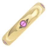 An 18ct gold ruby band ring,