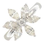 A diamond flower ring and a pair of matching diamond flower earrings.Estimated total diamond weight