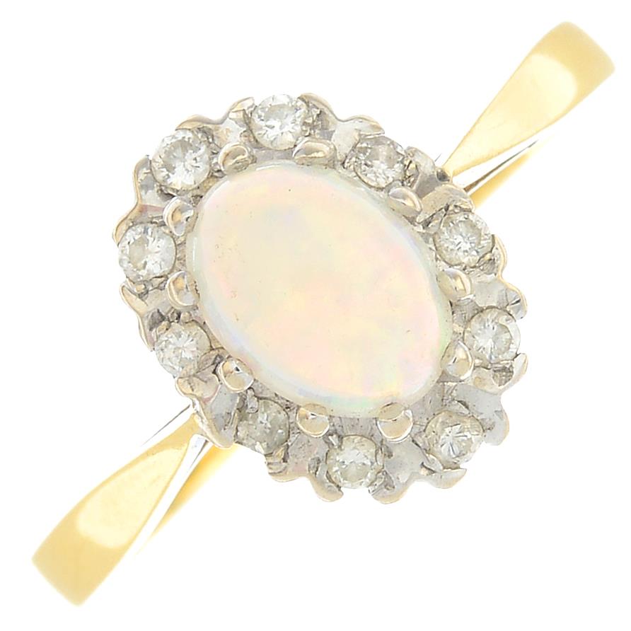 An opal and diamond cluster ring.