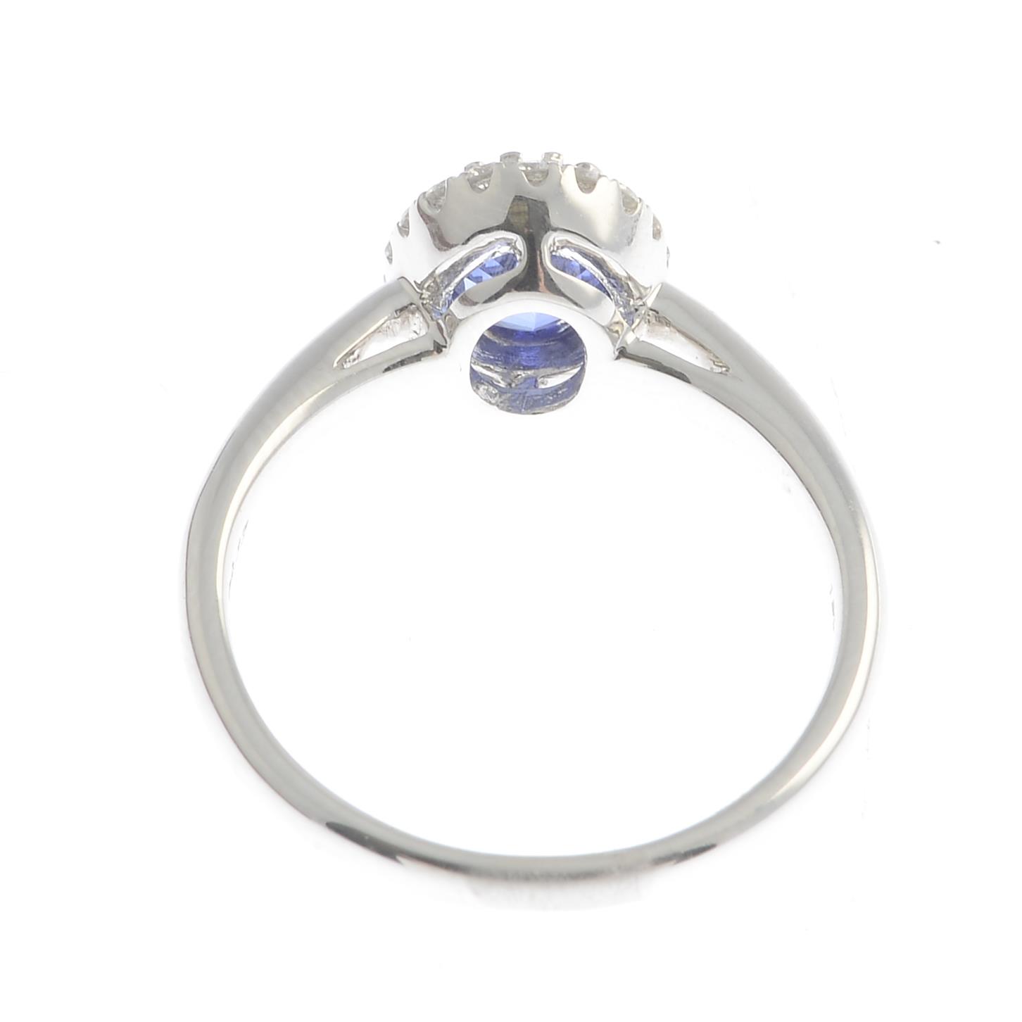 A sapphire and diamond dress ring.Sapphire weight 0.99ct, - Image 2 of 3