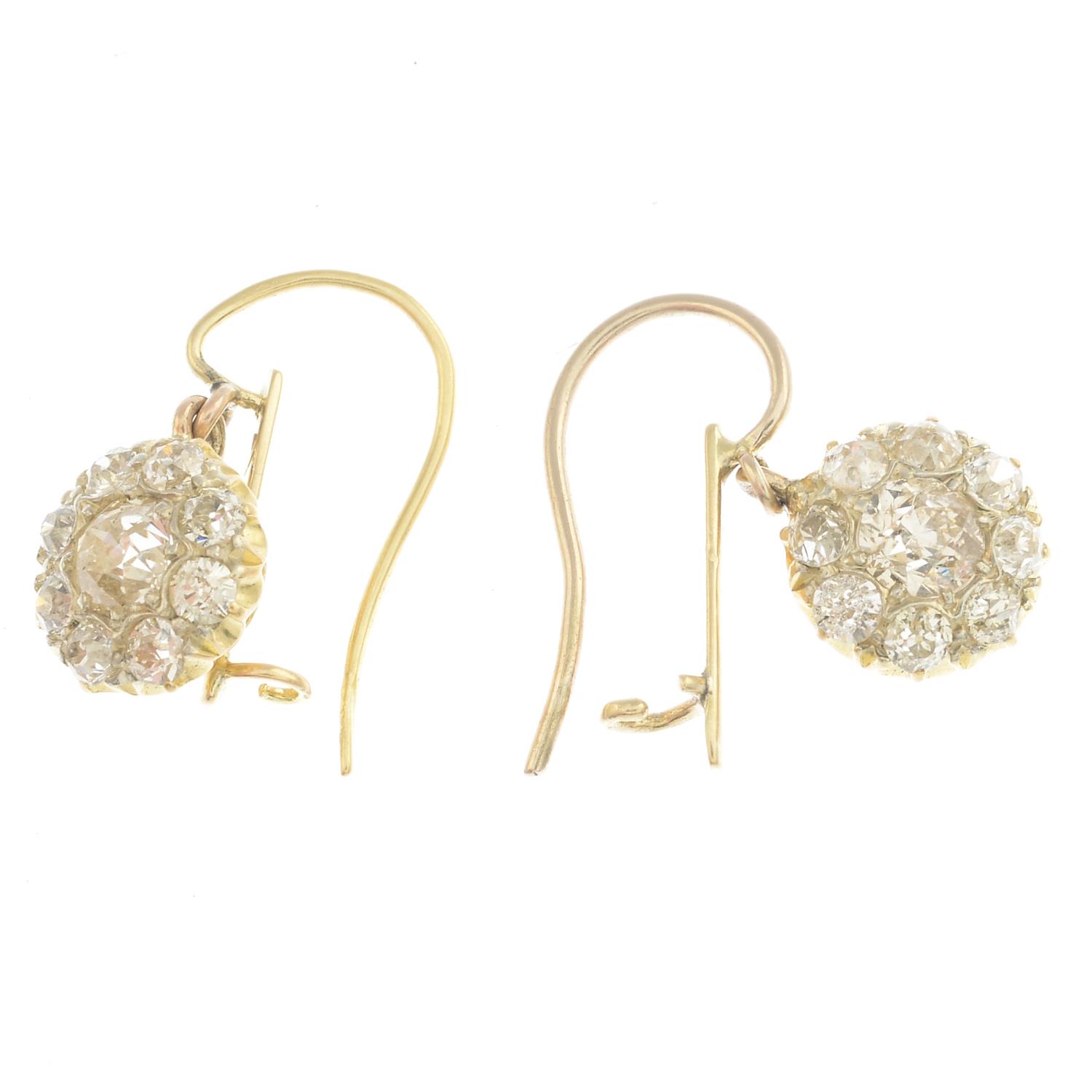 A pair of old-cut diamond cluster earrings. - Image 2 of 2