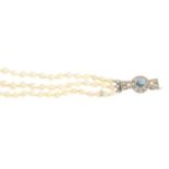 A graduated cultured pearl three-row necklace,