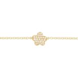 An 18ct gold diamond floral bracelet.