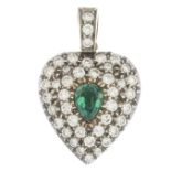 An emerald and diamond heart locket pendant.Estimated total diamond weight 0.75ct.Length 2.3cms.