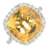 An 18ct gold citrine and brilliant-cut diamond dress ring.Citrine calculated weight 6.39cts,