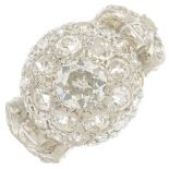 A vari-cut diamond domed dress ring,