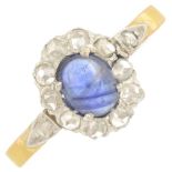 A sapphire and diamond cluster ring.Sapphire weight 0.35ct.Ring size M.