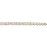 An 18ct gold diamond line bracelet.Estimated total diamond weight 5cts.Hallmarks for