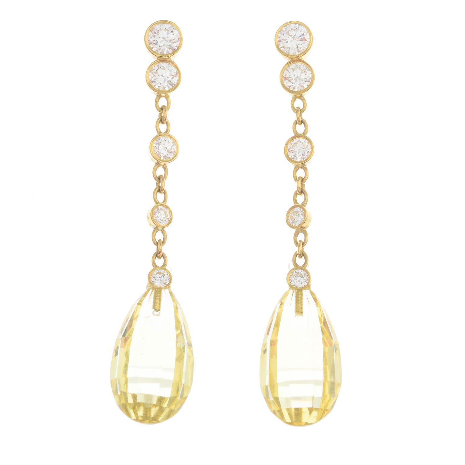 A pair of 18ct gold heliodor and diamond earrings.