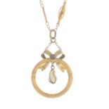 An early 20th century 9ct gold pearl and purple paste bow pendant,