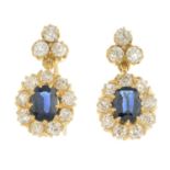 A pair of sapphire and diamond cluster earrings.Estimated total diamond weight 0.90ct,