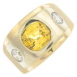 A yellow sapphire and diamond three-stone band ring.Sapphire calculated weight 4cts,