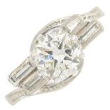 A diamond single-stone ring.Principal diamond estimated weight 0.80ct,