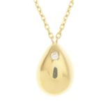 An 18ct gold diamond pendant,