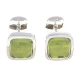 A pair of 18ct gold peridot cabochon cufflinks.