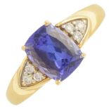 An 18ct gold tanzanite and diamond dress ring.Tanzanite calculated weight 2.11cts,