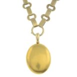 A late Victorian 15ct gold locket, with period chain.Locket stamped 15ct.Length of locket 4.6cms.