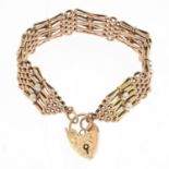A mid 20th century 9ct gold split pearl gate bracelet,