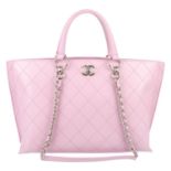 CHANEL - a pink quilted leather handbag.