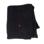 RALPH LAUREN - a cable-knit throw.