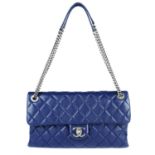 CHANEL - a blue quilted Single Flap handbag.