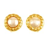 CHANEL - three clip-on earrings.