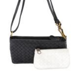 BOTTEGA VENETA - a black Intrecciato fold-out handbag and key pouch.