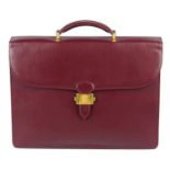 CARTIER - a Bordeaux leather briefcase.