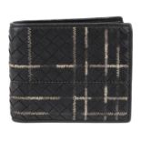 BOTTEGA VENETA - an Intrecciato leather bifold wallet.