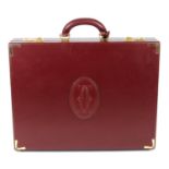 CARTIER - a Must De Cartier Bordeaux leather briefcase.