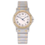 CARTIER - a lady's Santos Ronde bracelet watch.