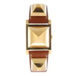 HERMÈS - a lady's Medor wrist watch. Gold plated case with stainless steel case back. Numbered