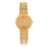 CORUM - a lady's Romulus bracelet watch. 18ct yellow gold case with factory diamond set chapter ring