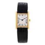 CARTIER - a Tank wrist watch. Yellow metal case, stamped 18k with poincon. Numbered 780865504.