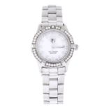 TAG HEUER - a lady's Aquaracer bracelet watch. Stainless steel case with factory diamond set