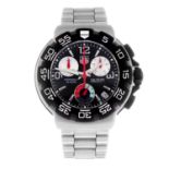 TAG HEUER - a gentleman's Formula 1 chronograph bracelet watch. Stainless steel case with calibrated